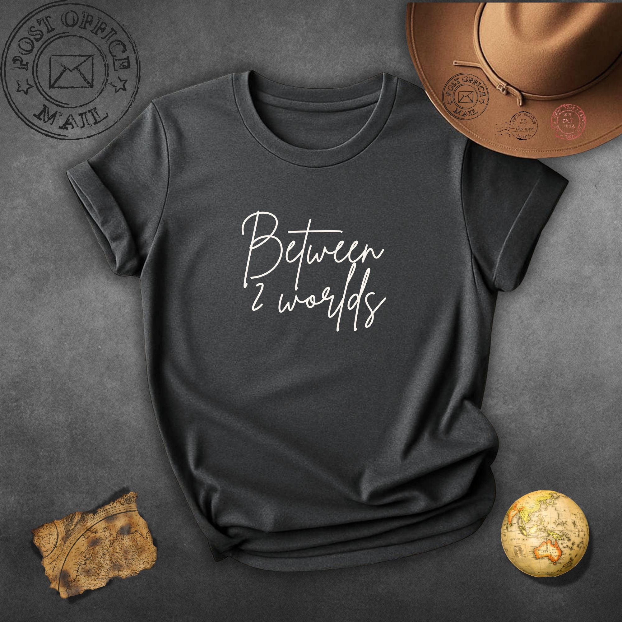 Between 2 Worlds T‑Shirt — Minimal Script Tee for Dreamers & Travelers
